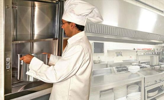 Chef uses kitchen dumbwaiter